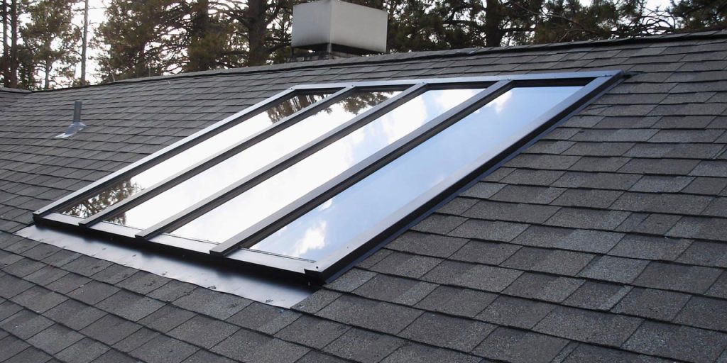 A large MAGS Gar skylight on a roof.
