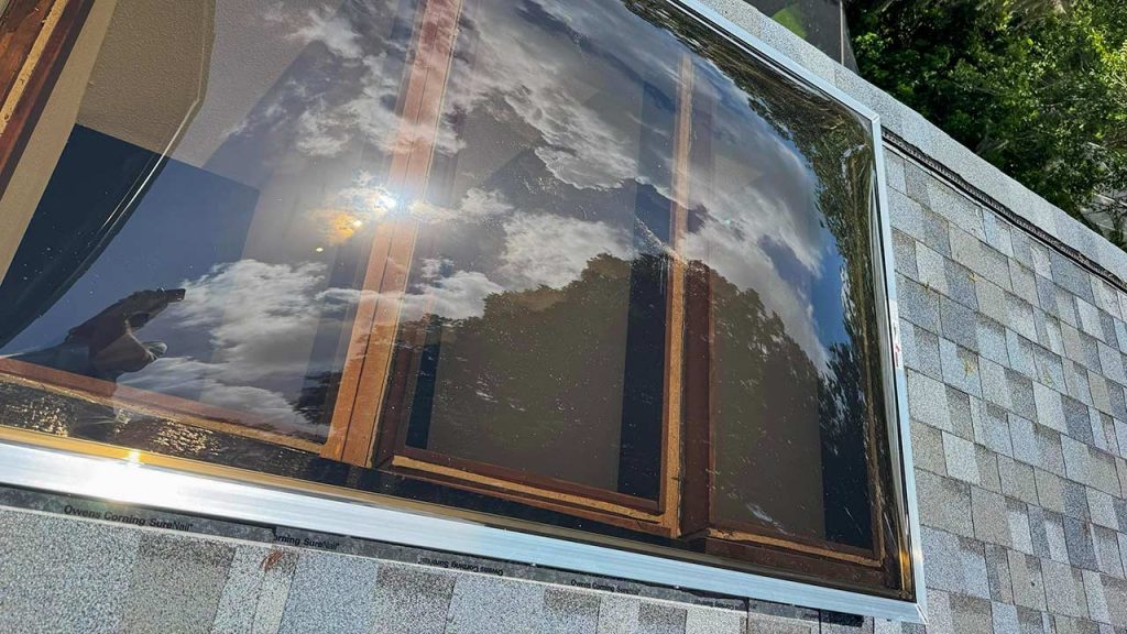 A closeup image of the replacement bronze acrylic dome skylight.