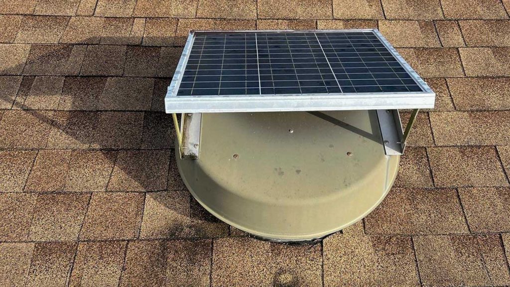 Existing, non-functioning attic ventilation fan prior to replacement with an Attic Breeze SFA-4523A solar attic fan.